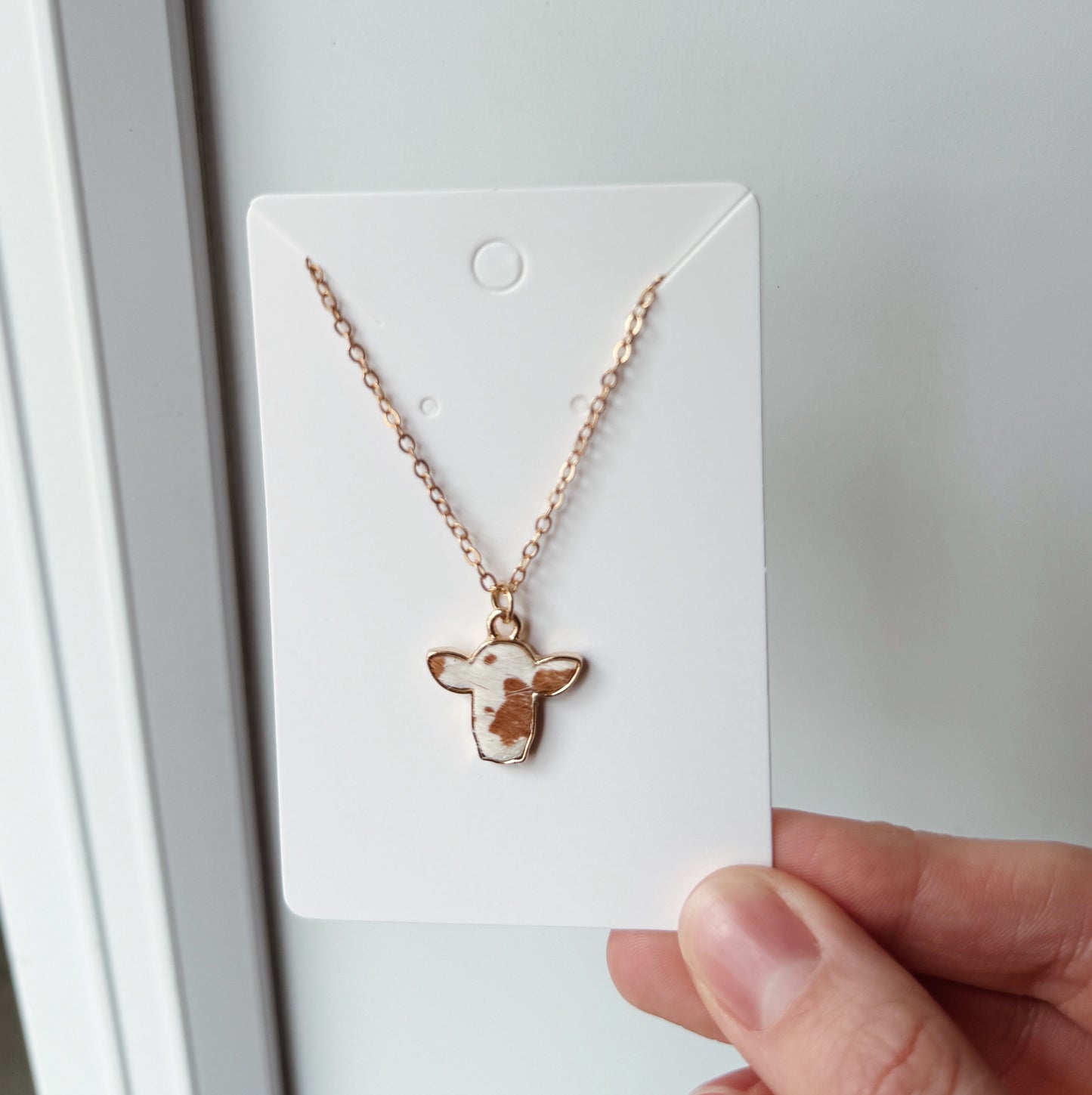 COW COWHIDE NECKLACE (BROWN)