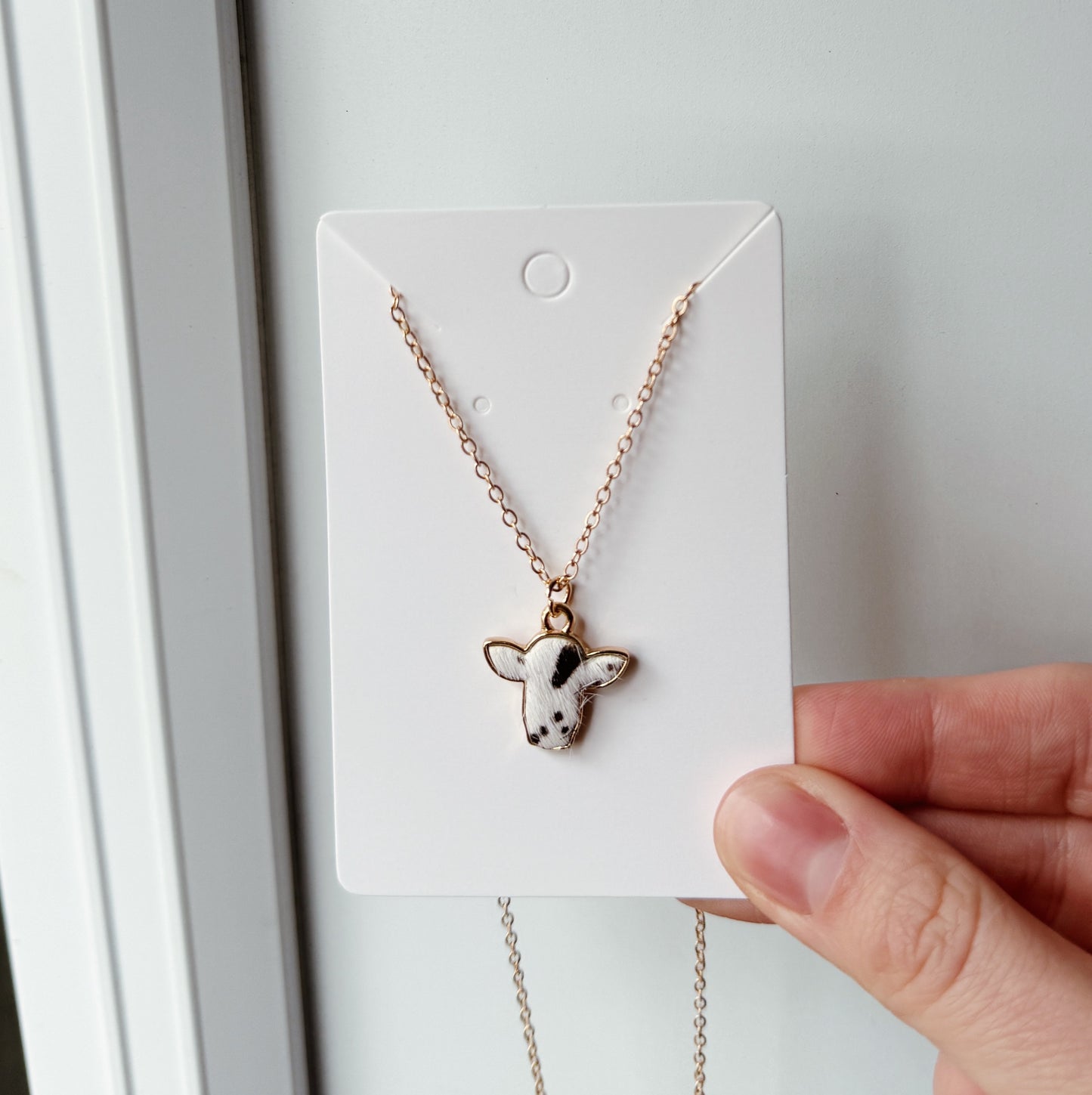 COW COWHIDE NECKLACE (BLK)