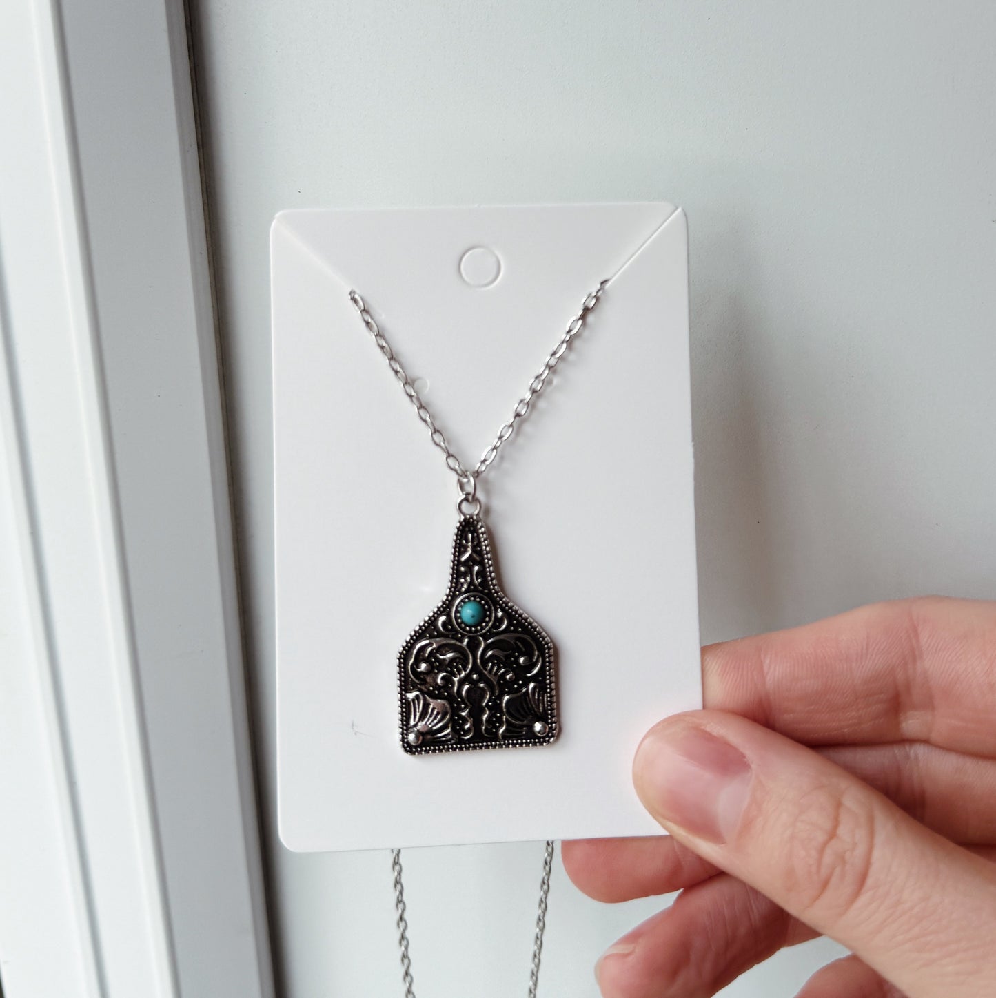 VINTAGE TURQUOISE STONE COW TAG NECKLACE